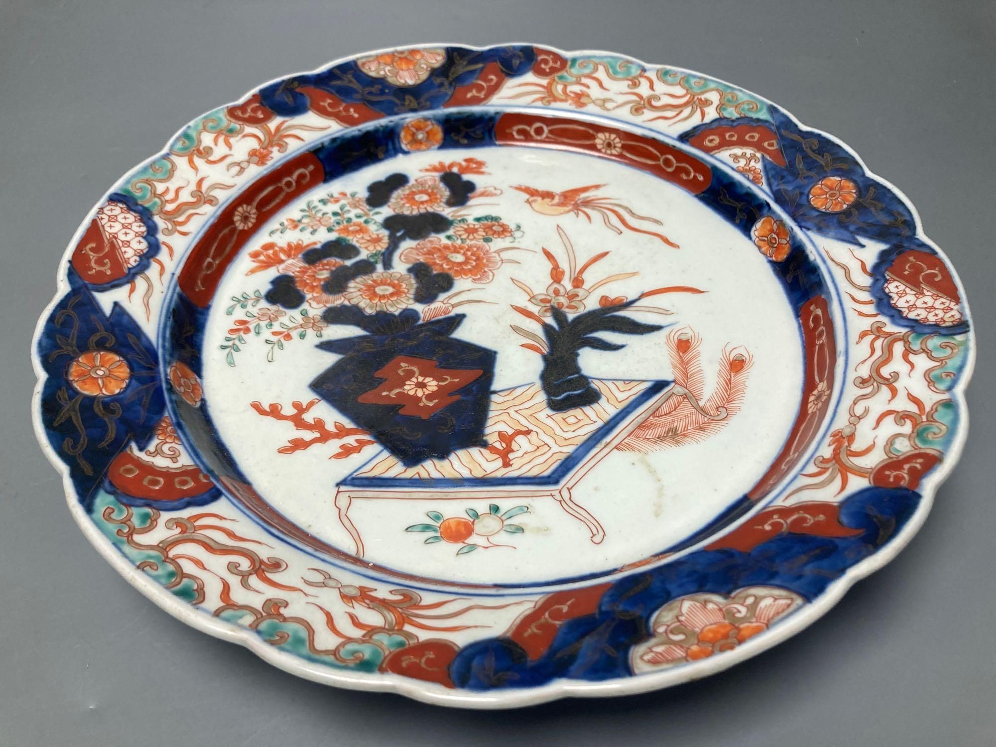 A 19th century Imari dish, painted in typical palette, 30.5cm diameter